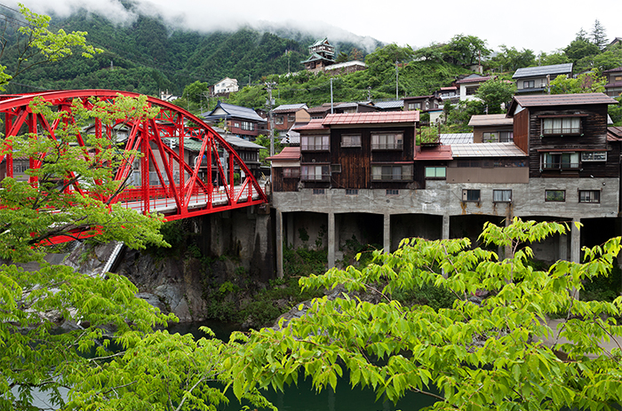 Kamioka castle from the Fujinami bridge over the Takahara river